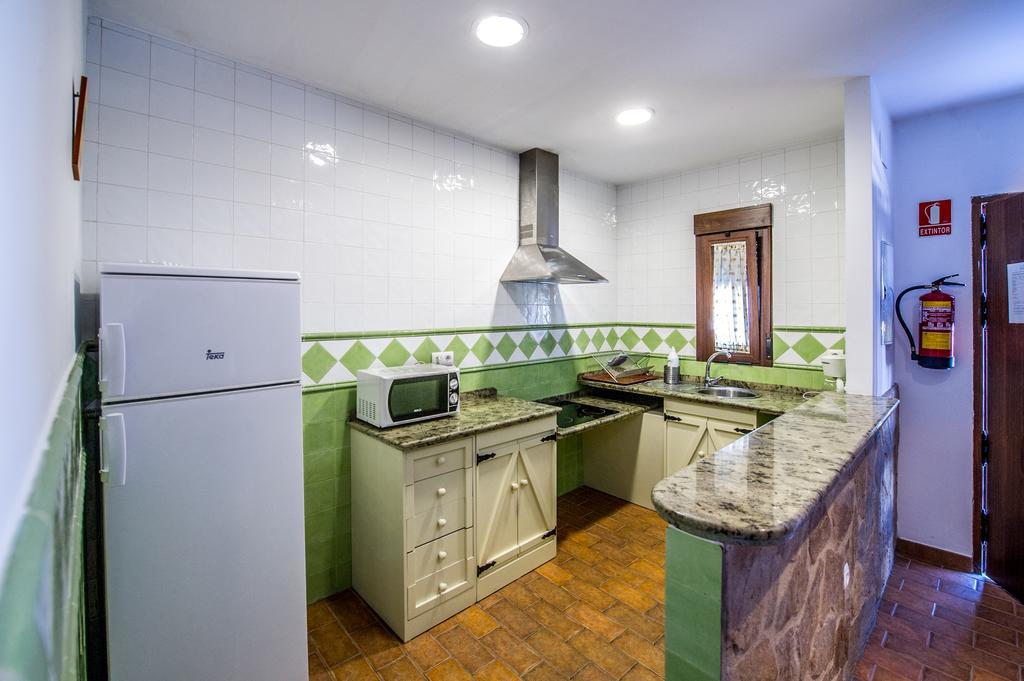 Apartamentos La Venta Del Charco Cardeña Rum bild